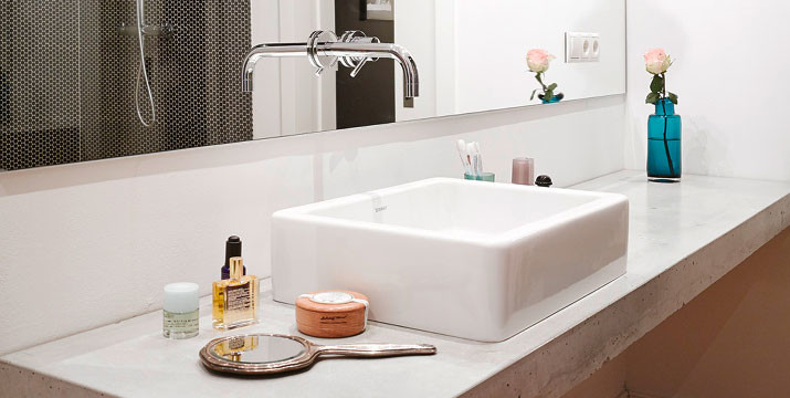 Design ideas for a contemporary bathroom in Berlin with a vessel sink, concrete benchtops and a built-in vanity.