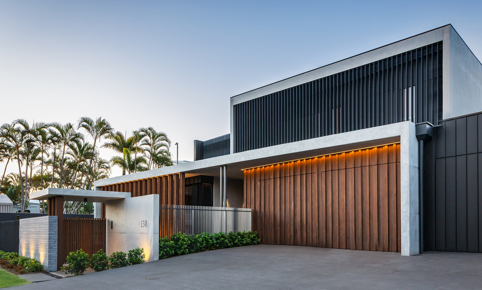 Contemporary two-storey multi-coloured house exterior in Sunshine Coast with a flat roof.
