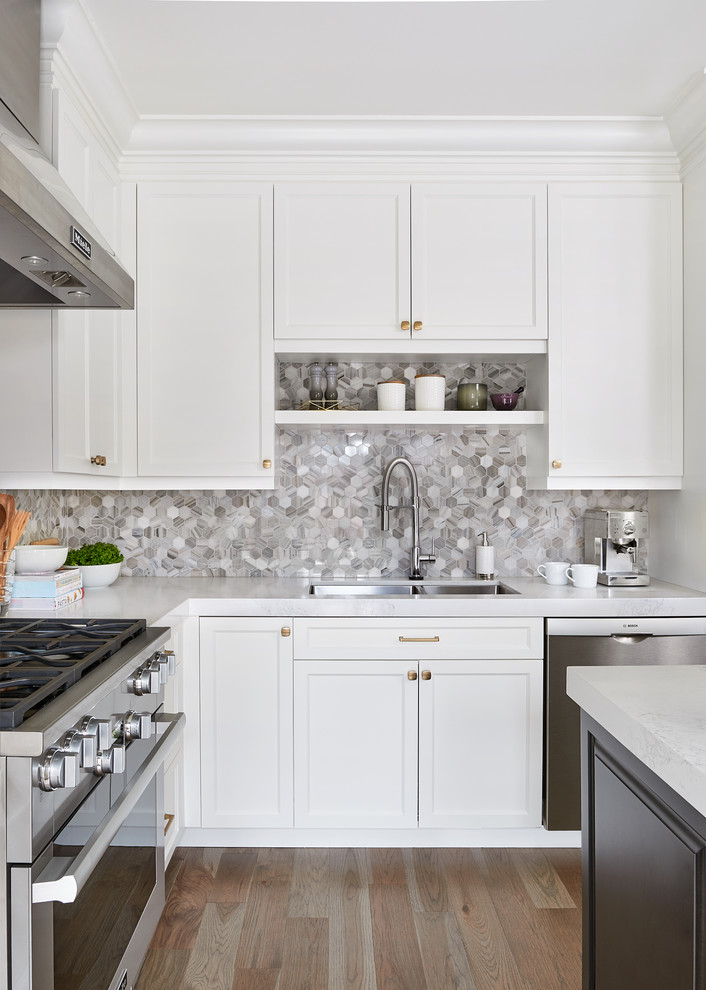This is an example of a transitional kitchen in Toronto.