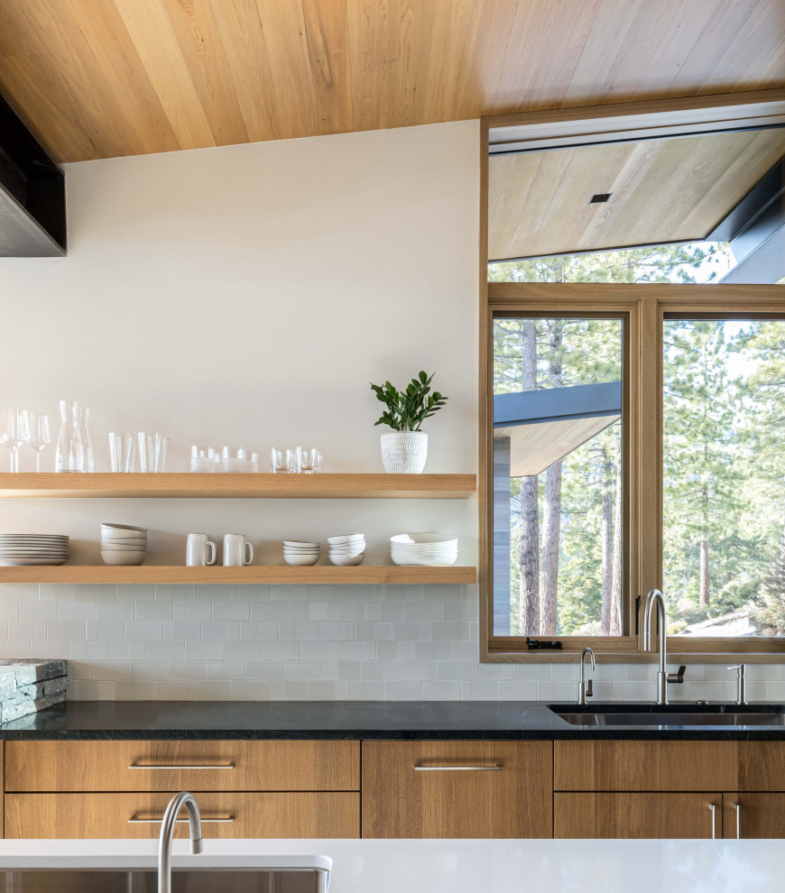 Large mountain style u-shaped wood ceiling open concept kitchen photo with flat-panel cabinets, quartz countertops, white backsplash, ceramic backsplash, paneled appliances and an island