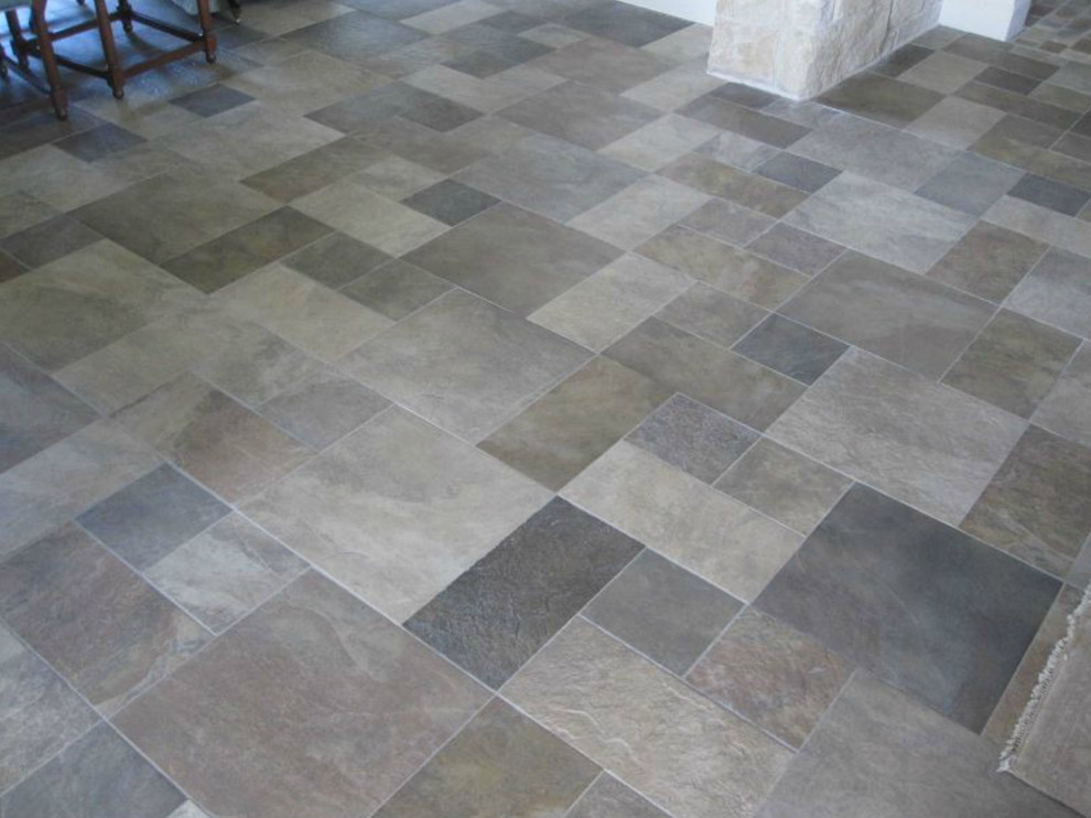 Example of a ceramic tile kitchen design in Austin