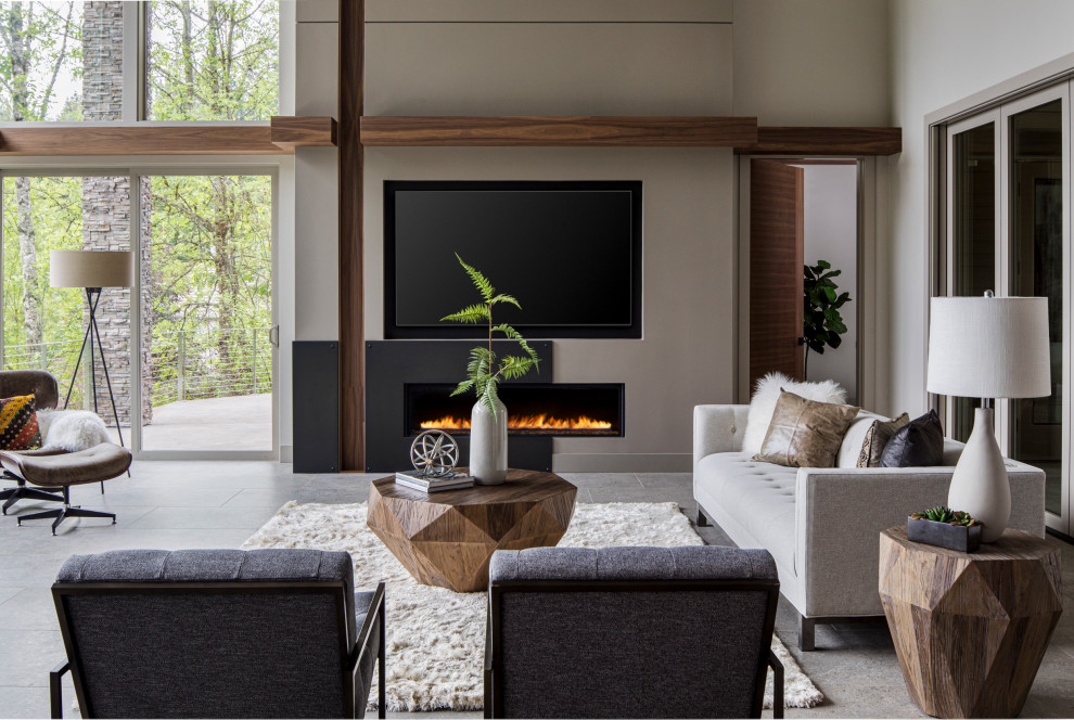 Inspiration for a large contemporary open concept living room in Portland with a home bar, grey walls, porcelain floors, a ribbon fireplace, a metal fireplace surround, a wall-mounted tv, grey floor and vaulted.