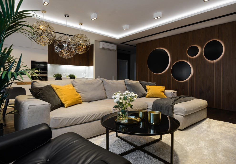 Idee per un soggiorno contemporaneo con TV a parete