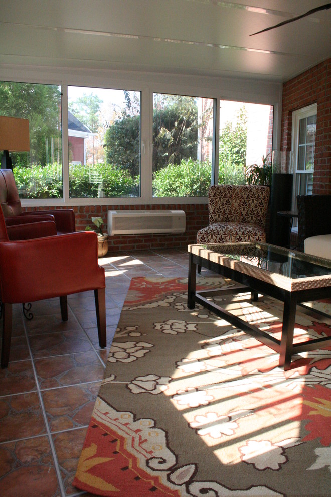 Photo of an eclectic sunroom in Atlanta.
