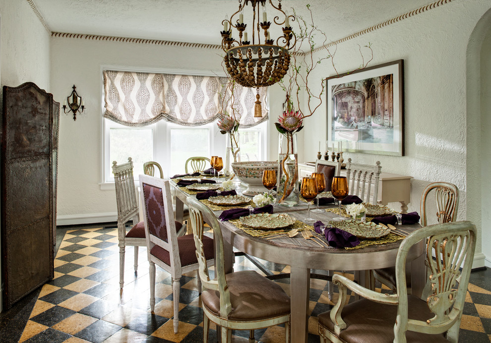 Design ideas for a traditional dining room in Chicago with white walls.
