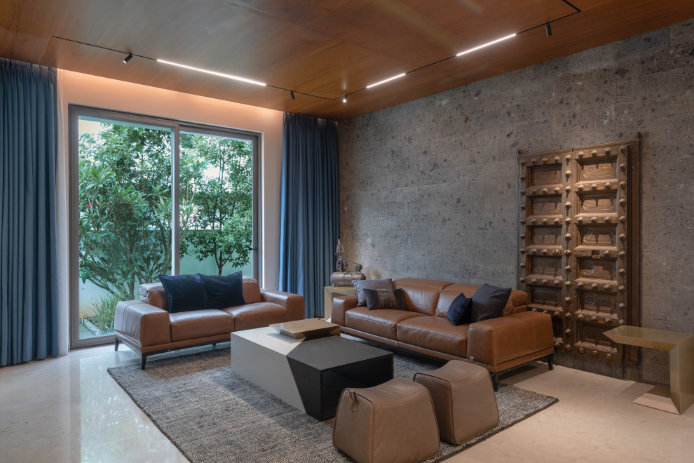 This is an example of a contemporary living room in Hyderabad.