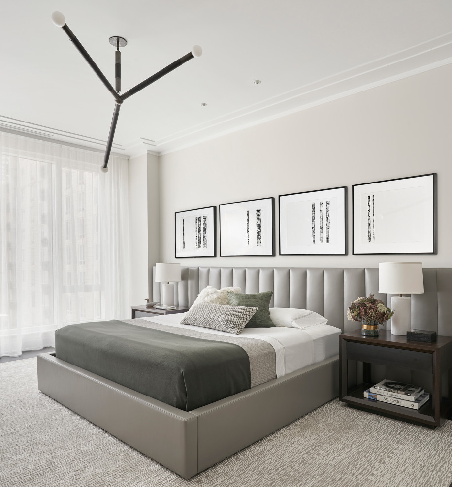 Contemporary bedroom in Chicago with white walls.