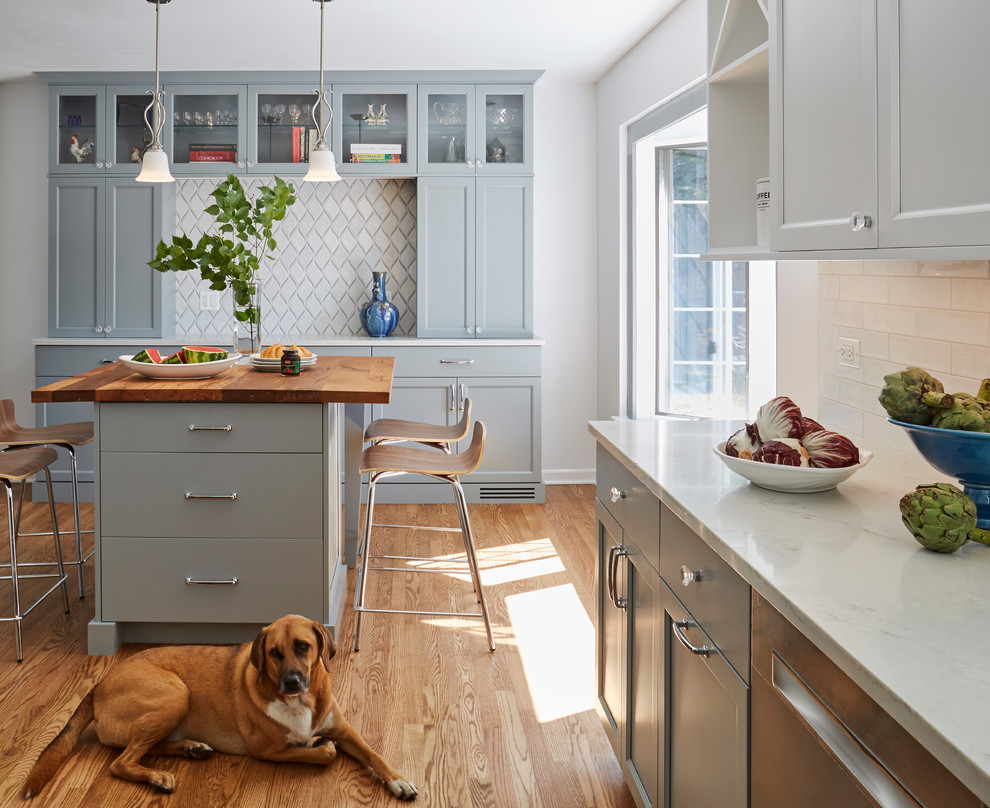 Inspiration for a transitional kitchen remodel in Chicago with an island