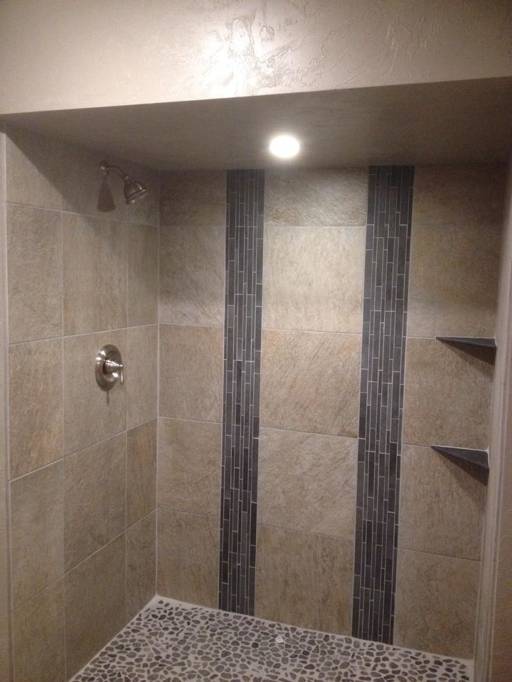 This is an example of a contemporary 3/4 bathroom in Other with an alcove shower, beige tile and ceramic tile.