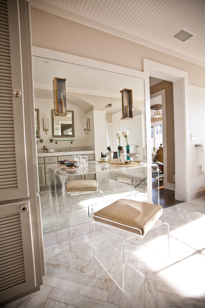 Eclectic bathroom in San Diego with louvered cabinets.