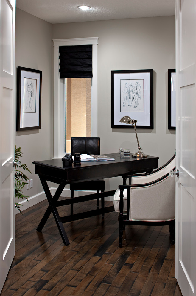 Design ideas for a transitional home office in Calgary.