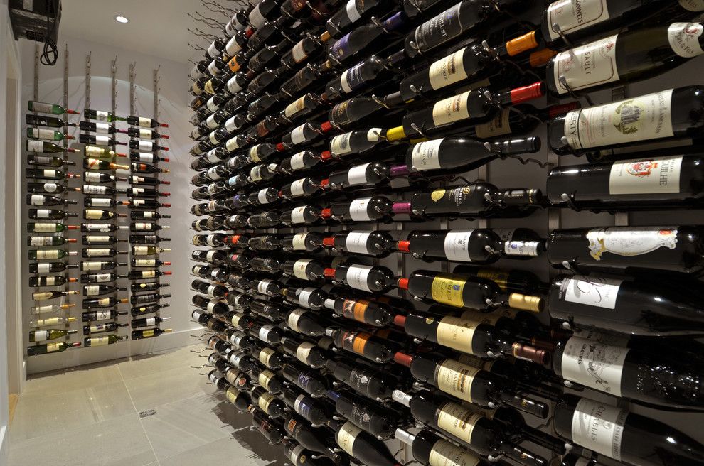 This is an example of a contemporary wine cellar in Vancouver.