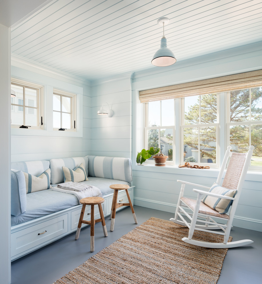 Design ideas for a beach style sunroom in Portland Maine with no fireplace, a standard ceiling and grey floor.