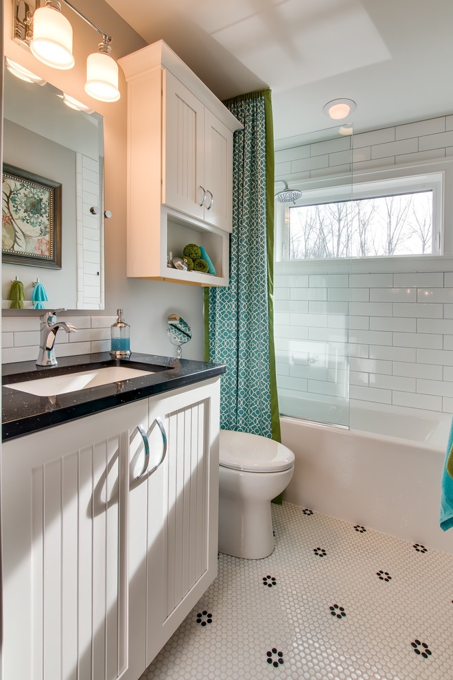 Design ideas for a small beach style kids bathroom in Cleveland with beaded inset cabinets, white cabinets, a shower/bathtub combo, a one-piece toilet, gray tile, subway tile, grey walls, mosaic tile floors, an undermount sink, engineered quartz benchtops, an alcove tub, white floor and an open shower.