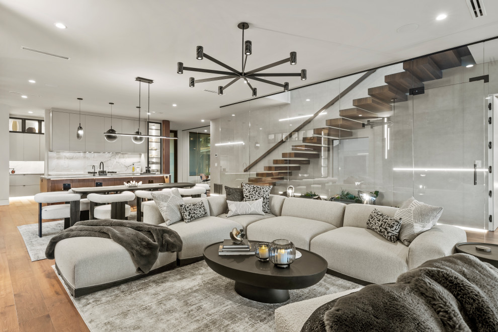 Modern Luxury Lakehouse Open-Concept Living Room with Glass Staircase ...