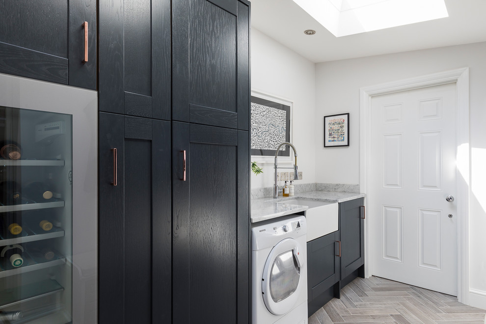 Inspiration for a contemporary laundry room in London.