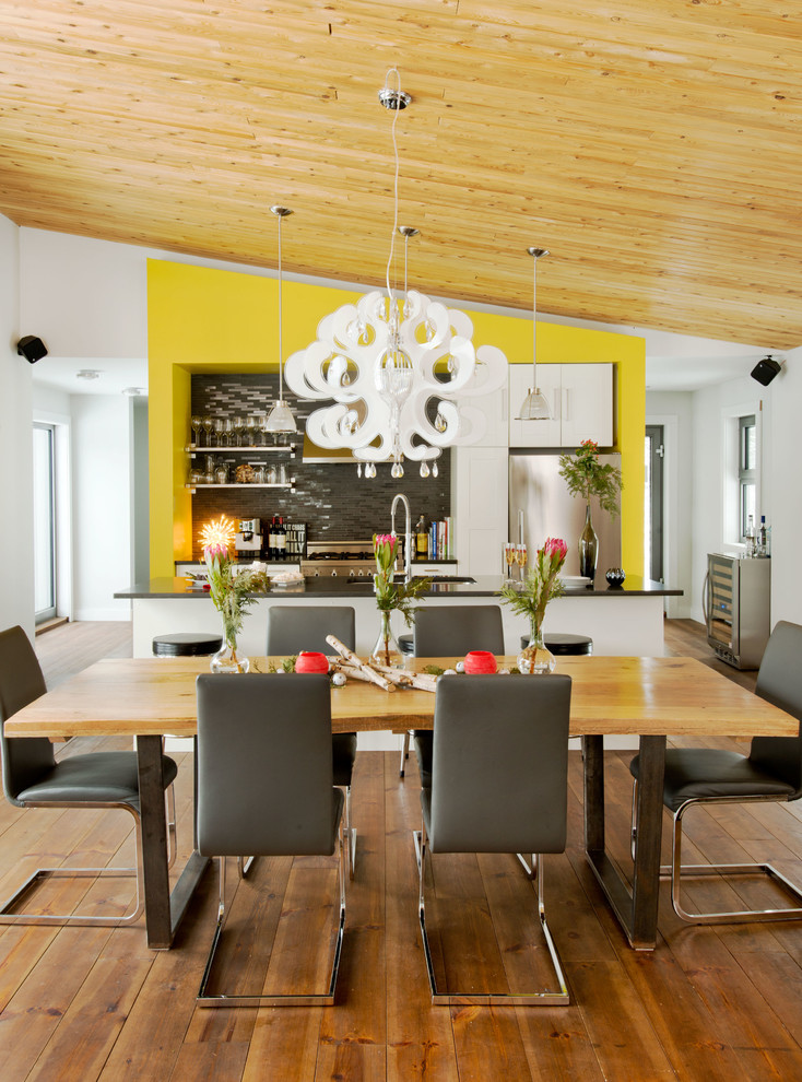 Design ideas for a contemporary open plan dining in Montreal.