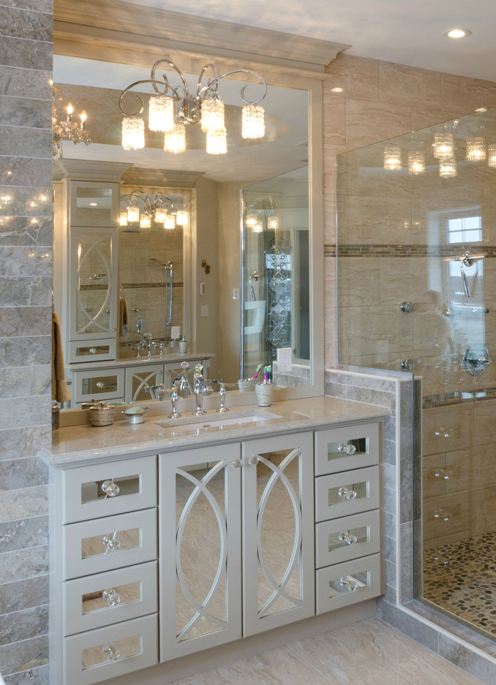 Photo of a small transitional master bathroom in Other with recessed-panel cabinets, beige cabinets, engineered quartz benchtops, a freestanding tub, an open shower, beige tile, ceramic tile, multi-coloured walls and travertine floors.