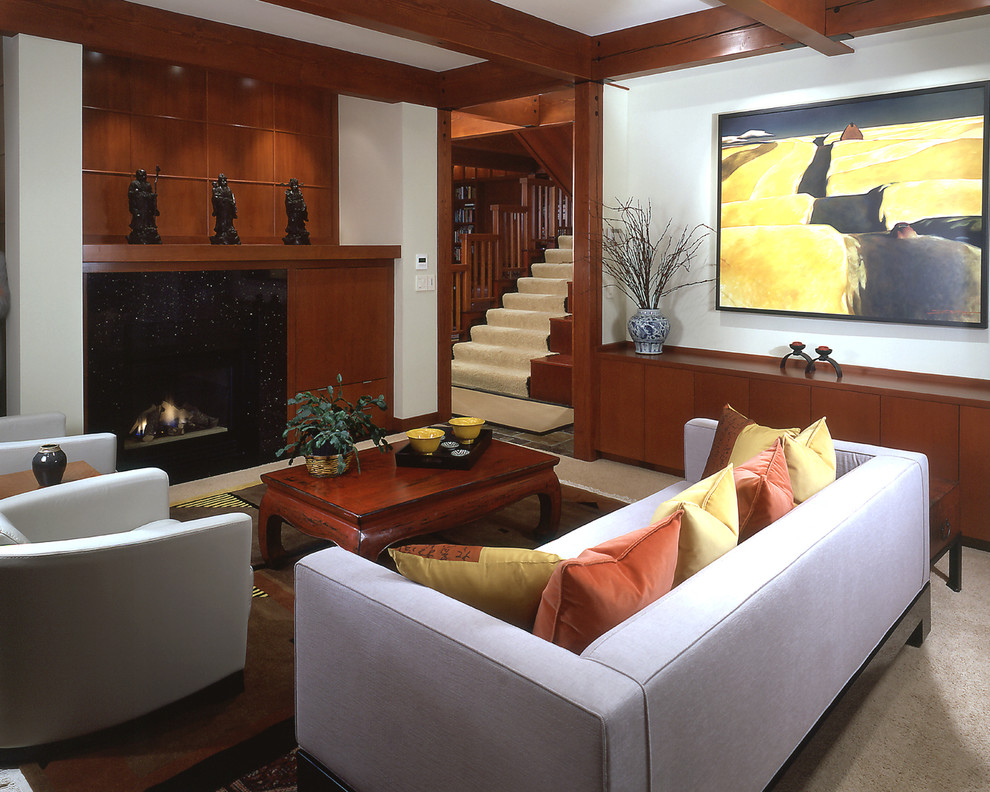 Mid-sized trendy formal and enclosed carpeted living room photo in Seattle with white walls, a standard fireplace, a tile fireplace and a concealed tv