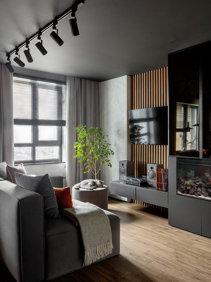 На фото: парадная, открытая гостиная комната среднего размера:: освещение в современном стиле с серыми стенами, полом из винила, телевизором на стене, коричневым полом, потолком с обоями и обоями на стенах без камина с
