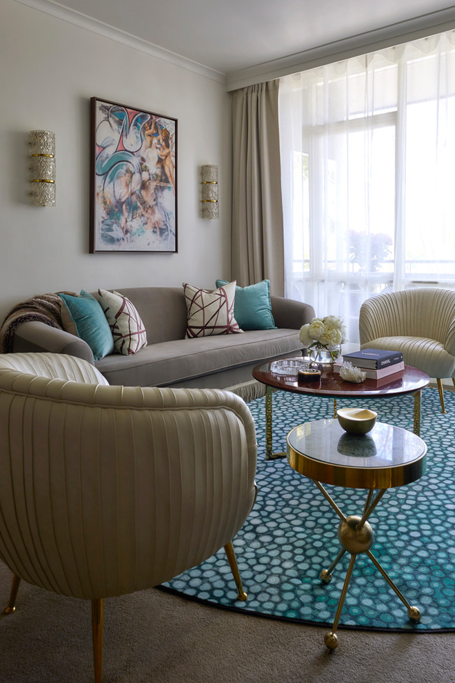 Photo of a mid-sized eclectic formal enclosed living room in Melbourne with white walls, carpet, a concealed tv and turquoise floor.