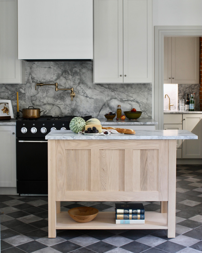 Enclosed kitchen - mid-sized traditional l-shaped ceramic tile and multicolored floor enclosed kitchen idea in Minneapolis with an undermount sink, shaker cabinets, gray cabinets, marble countertops, gray backsplash, marble backsplash, black appliances, an island and gray countertops