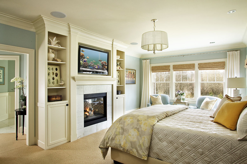Inspiration for a traditional master bedroom in Portland with blue walls and carpet.