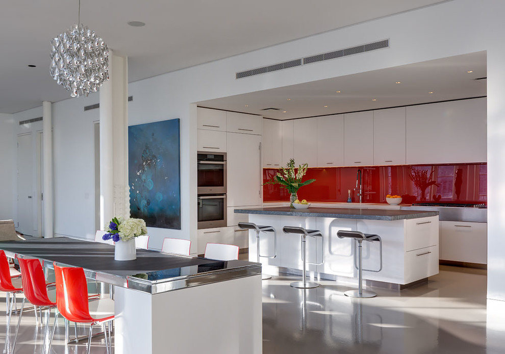 Design ideas for a contemporary u-shaped kitchen in New York with with island.