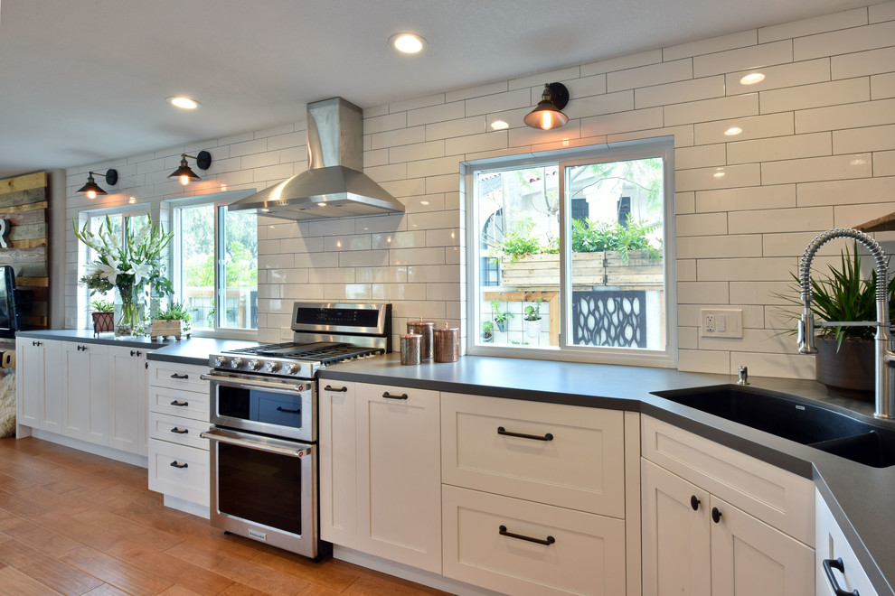 Example of a transitional kitchen design in San Diego