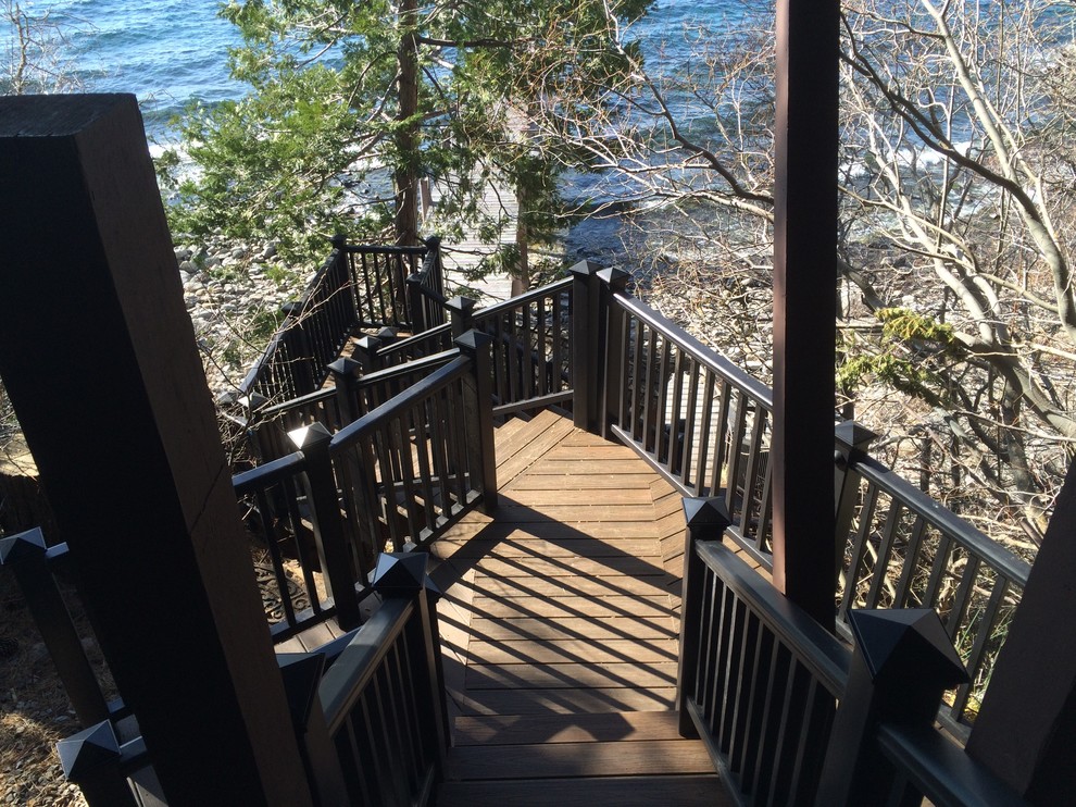 Deck - mid-sized transitional backyard deck idea with no cover