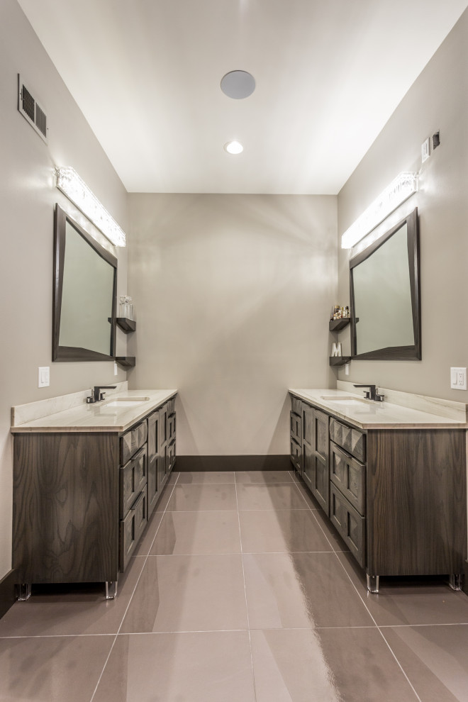 This is an example of a contemporary master bathroom in Other with furniture-like cabinets.