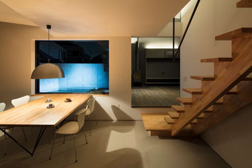 Design ideas for a modern dining room in Tokyo Suburbs.