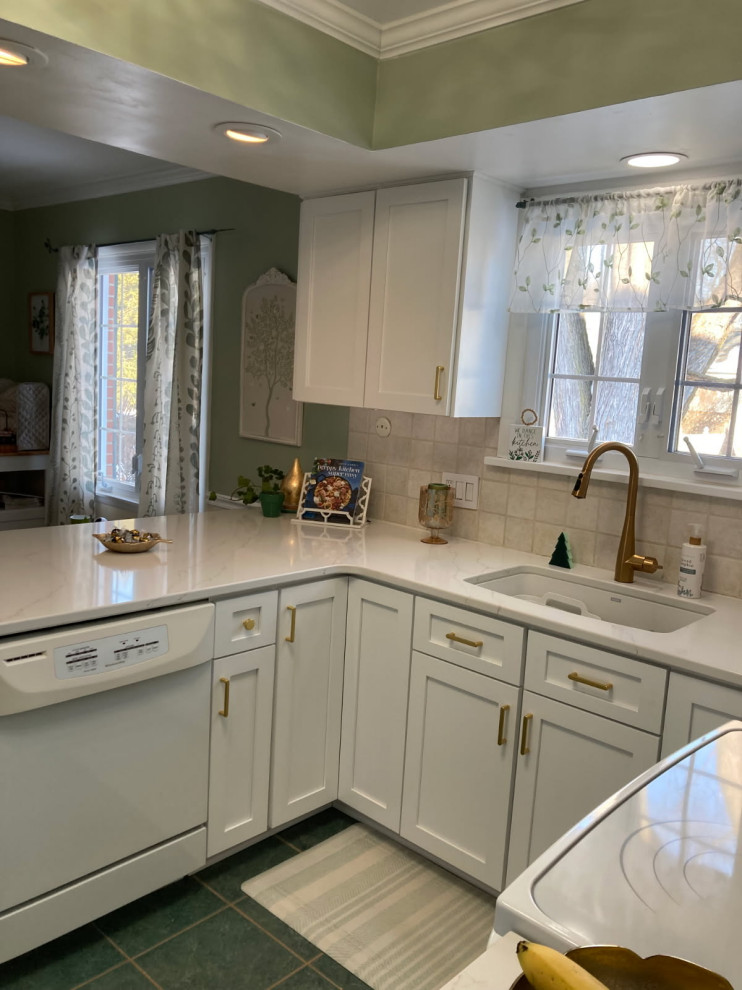 Inspiration for a mid-sized transitional u-shaped enclosed kitchen remodel with shaker cabinets, white cabinets and quartz countertops
