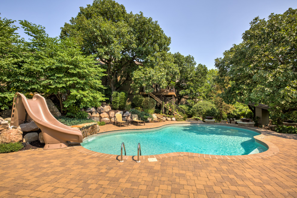 Photo of a traditional pool in Omaha.