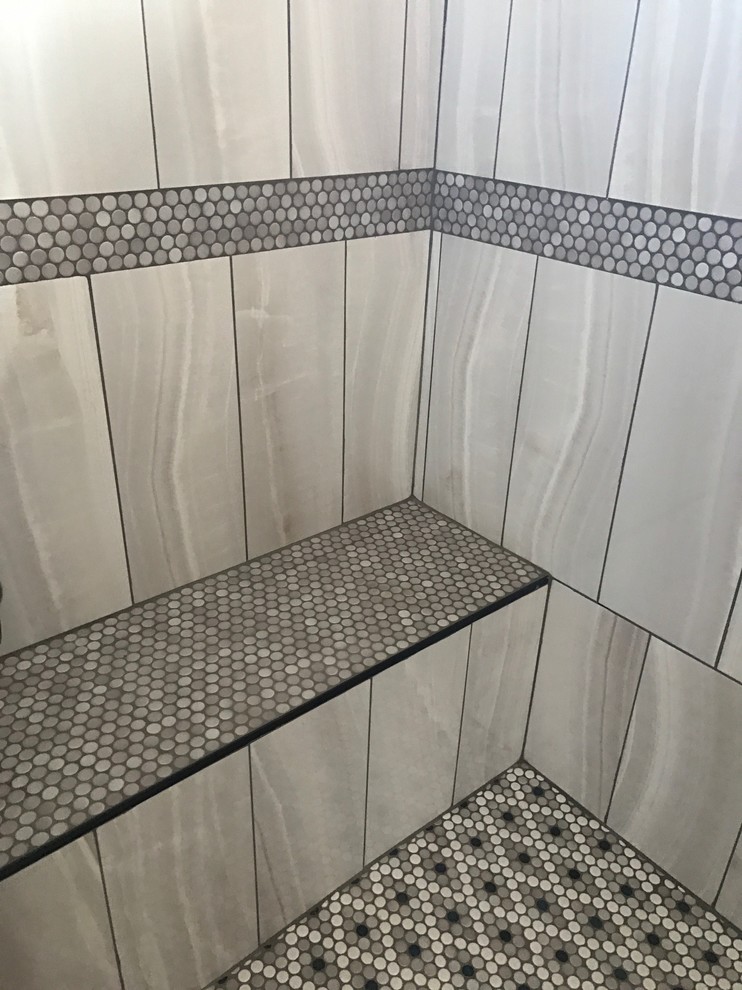 Mid-sized transitional master gray tile and porcelain tile mosaic tile floor and gray floor alcove shower photo in Phoenix with a pedestal sink, black walls and a hinged shower door