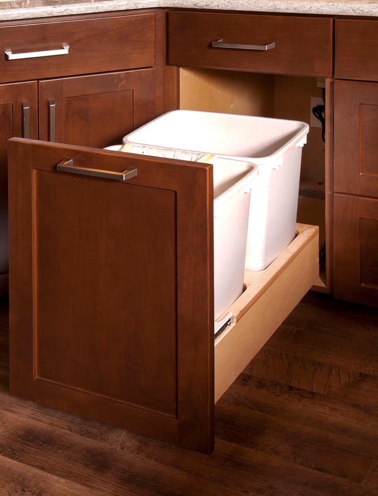 Example of a mid-sized transitional dark wood floor kitchen design in Seattle with an undermount sink, shaker cabinets, dark wood cabinets, beige backsplash, subway tile backsplash, stainless steel appliances and a peninsula