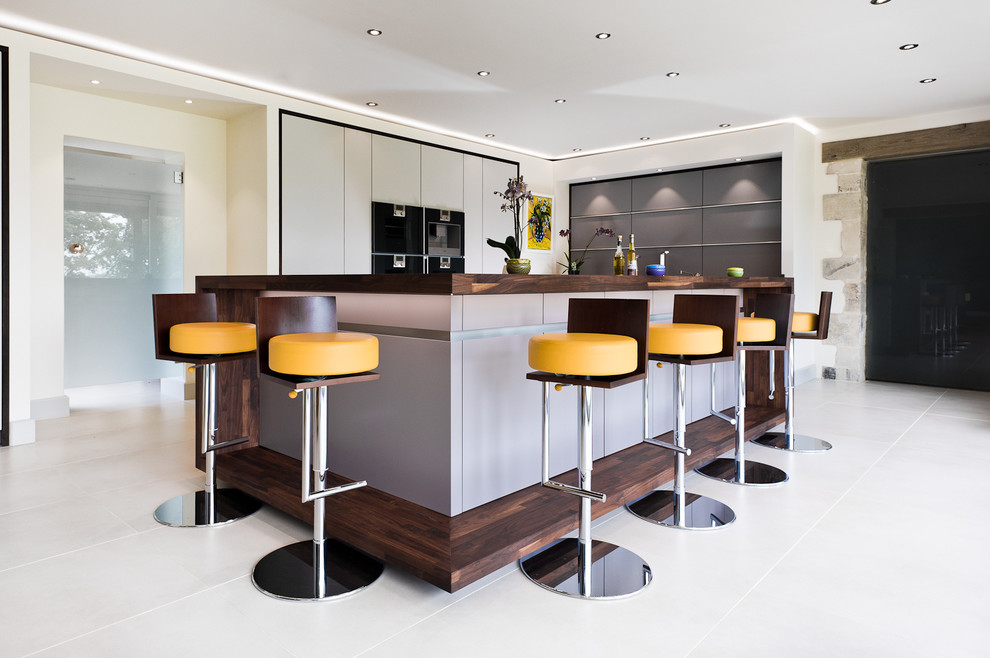This is an example of a large contemporary kitchen in Gloucestershire.