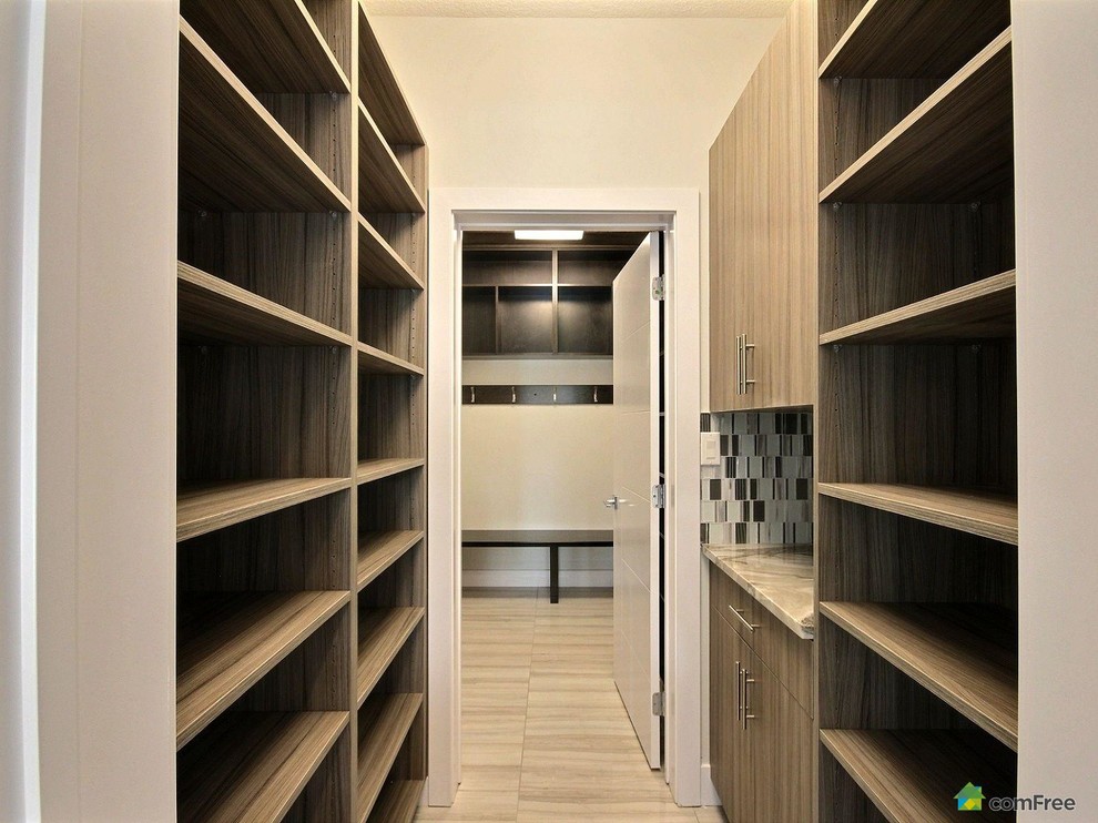 Example of a transitional home design design in Edmonton