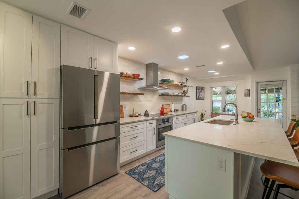 Example of a transitional kitchen design in Austin