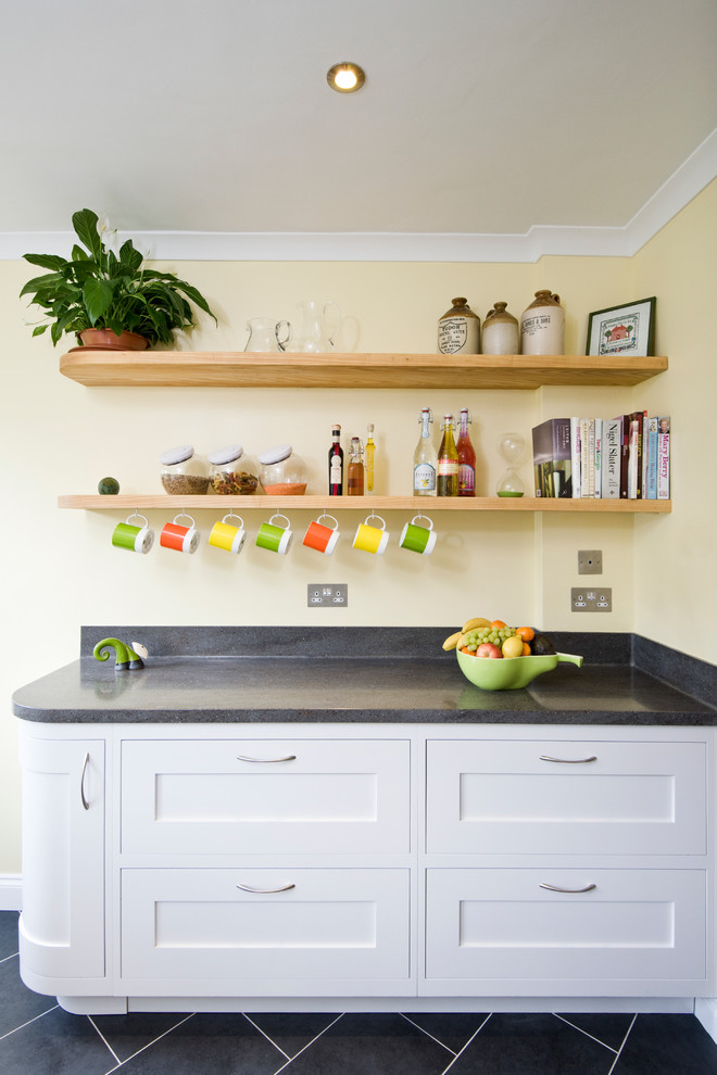 Photo of a traditional kitchen in Hertfordshire with shaker cabinets and white cabinets.