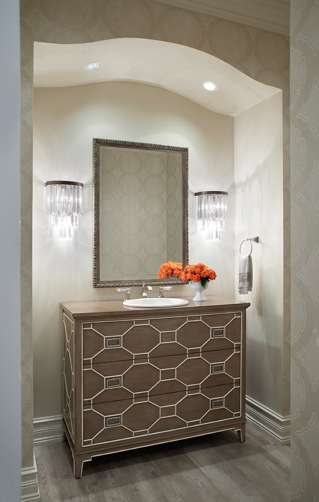 Design ideas for an expansive transitional 3/4 bathroom in Detroit with a drop-in sink, furniture-like cabinets, brown cabinets, wood benchtops, gray tile, vinyl floors and beige walls.