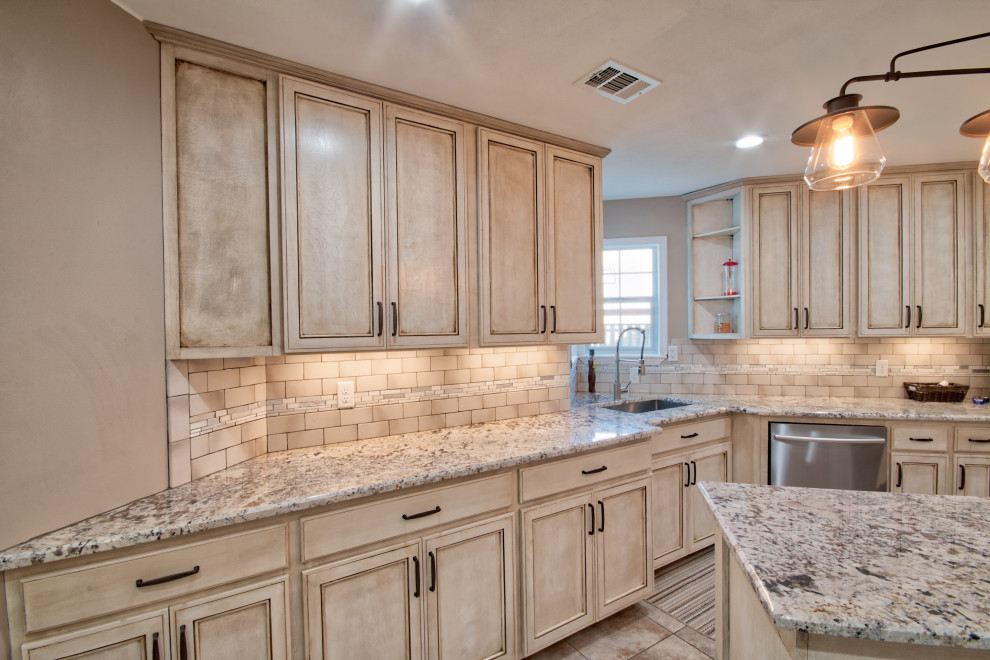 Kitchen - large l-shaped cement tile floor and beige floor kitchen idea with an undermount sink, flat-panel cabinets, granite countertops, cement tile backsplash, stainless steel appliances, an island and white countertops