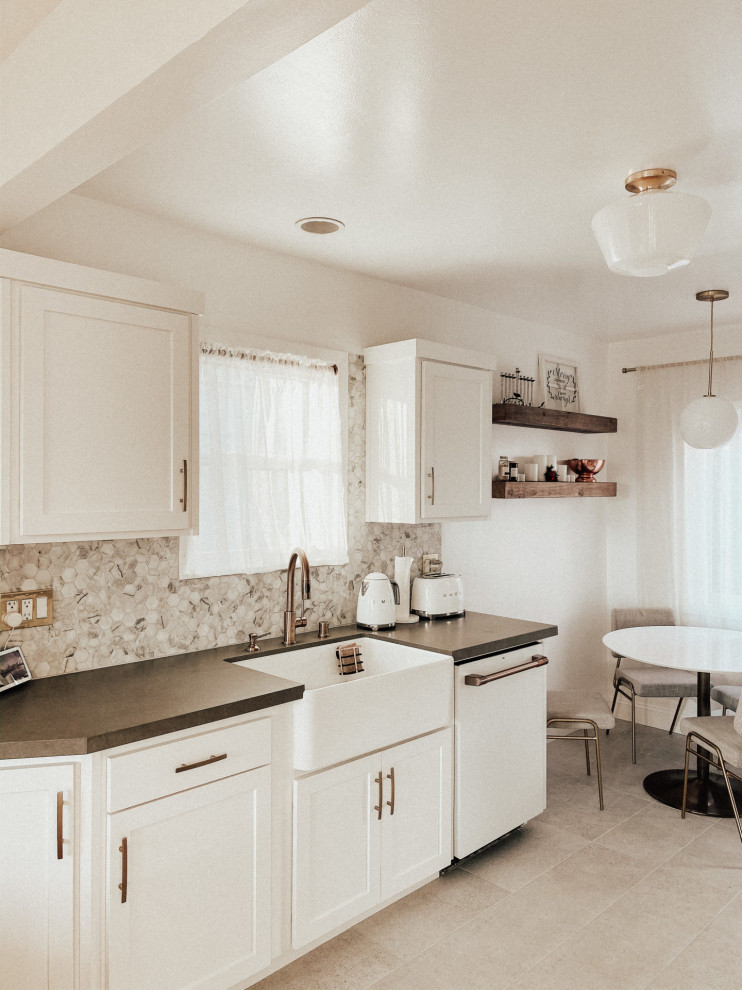 Inspiration for a mid-sized transitional ceramic tile and beige floor eat-in kitchen remodel in Denver with a farmhouse sink, shaker cabinets, white cabinets, quartz countertops, multicolored backsplash, mosaic tile backsplash, white appliances and gray countertops