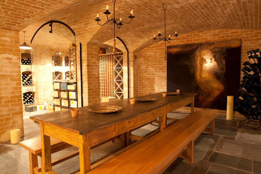 Inspiration for a country wine cellar in London with diamond bins.