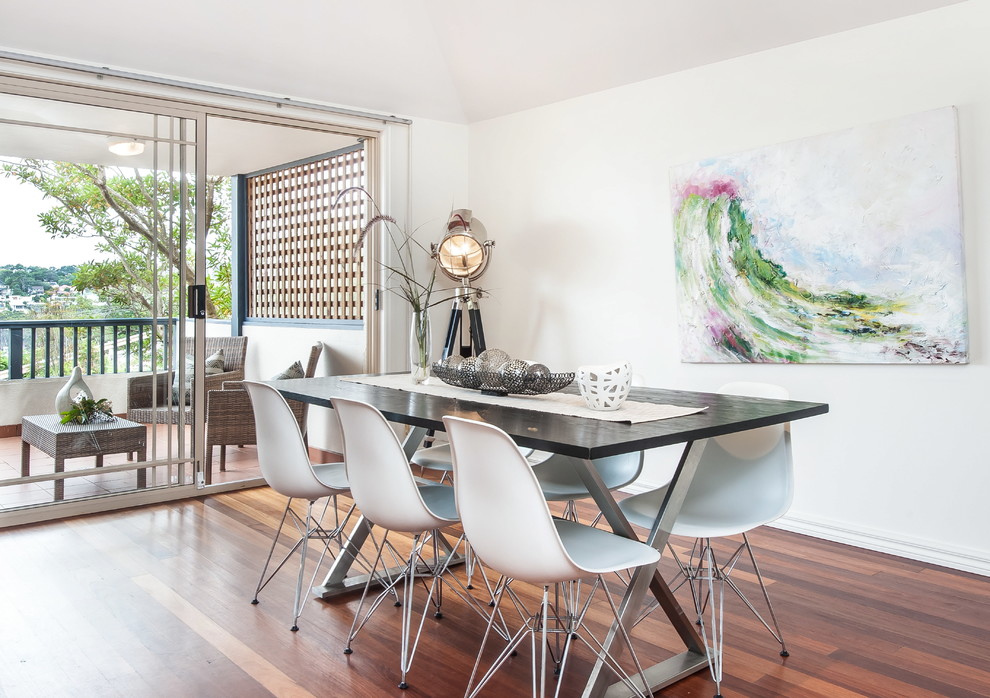 Inspiration for a contemporary dining room in Sydney with white walls and no fireplace.
