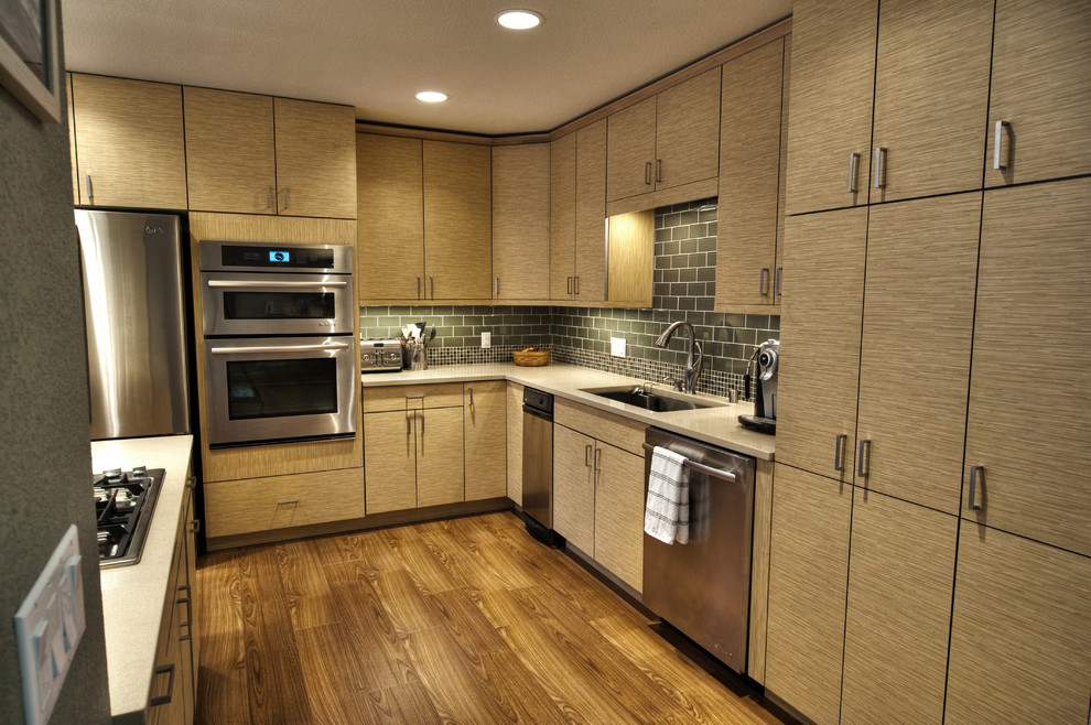 Design ideas for a contemporary kitchen in Other with stainless steel appliances.