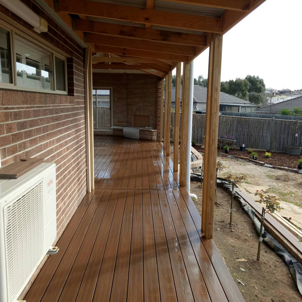 Photo of a large contemporary deck in Melbourne with a pergola.