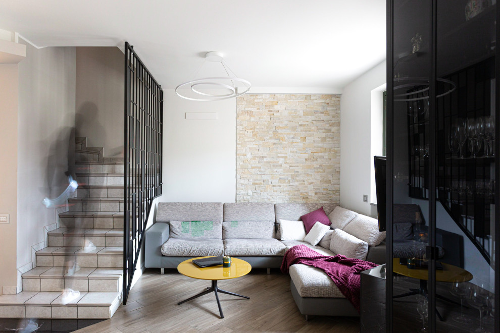 Immagine di un soggiorno minimal di medie dimensioni e aperto