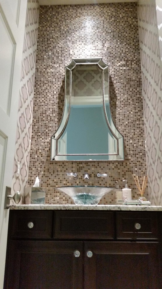 Photo of a transitional powder room in Detroit.