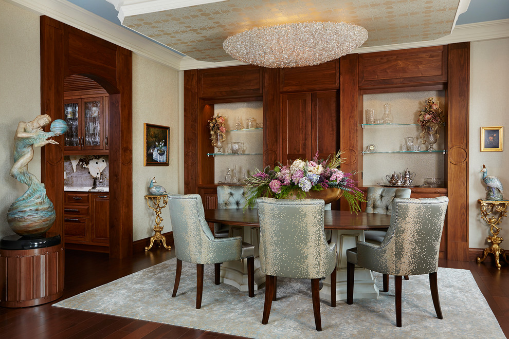 Inspiration for a traditional dining room in Minneapolis with beige walls and dark hardwood floors.